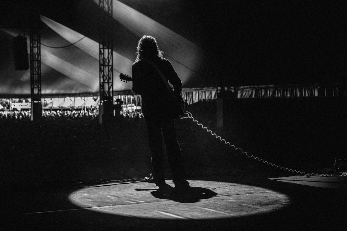 Festival photography — festival grounds with audience at sunset