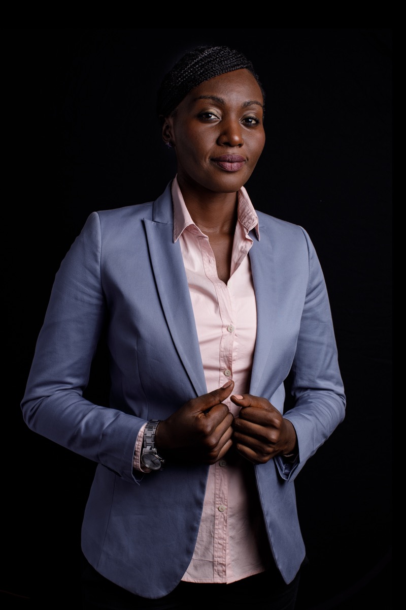 Low-key studio portrait of a female professional